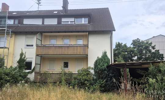 Sanierungsbedürftiges Mehrfamilienhaus in ruhiger Lage mit großem Grundstück!