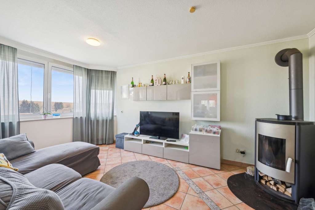 Immobilie in Esselbach - Sonnige Oase: Helle 57 m² Wohnung mit großem Garten und toskanischem Flair - Bild 0