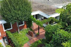 Hannover Marienwerder: Gartenhofbungalow und Garage, in besonderer Wohnanlage