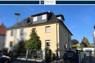 Zweifamilienhaus mit Einliegerwohnung und parkähnlicher Gartenanlage