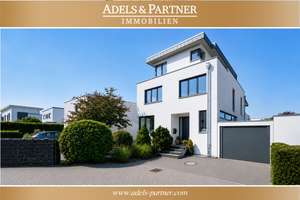 Anspruchsvolles Wohnen in Widdersdorf: Modernes Einfamilienhaus mit Einliegerwohnung & Südwestgarten