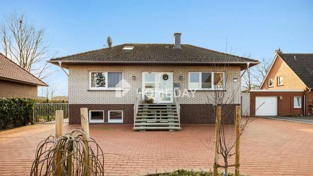 Immobilie in Lastrup - Stilvoll modernisiertes Einfamilienhaus mit großzügigem Garten, Terrassen und Solaranlage - Bild 0