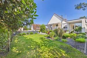 Ein Zuhause mit Lebensqualität: Familienfreundliches Wohnen in Bestlage mit sonnigem Garten