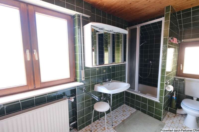 Immobilie in Remseck am Neckar - Familie, Natur, Ruhe: Gepflegtes Haus mit Bachplätschern und Garten in Waldnähe - Bild 1