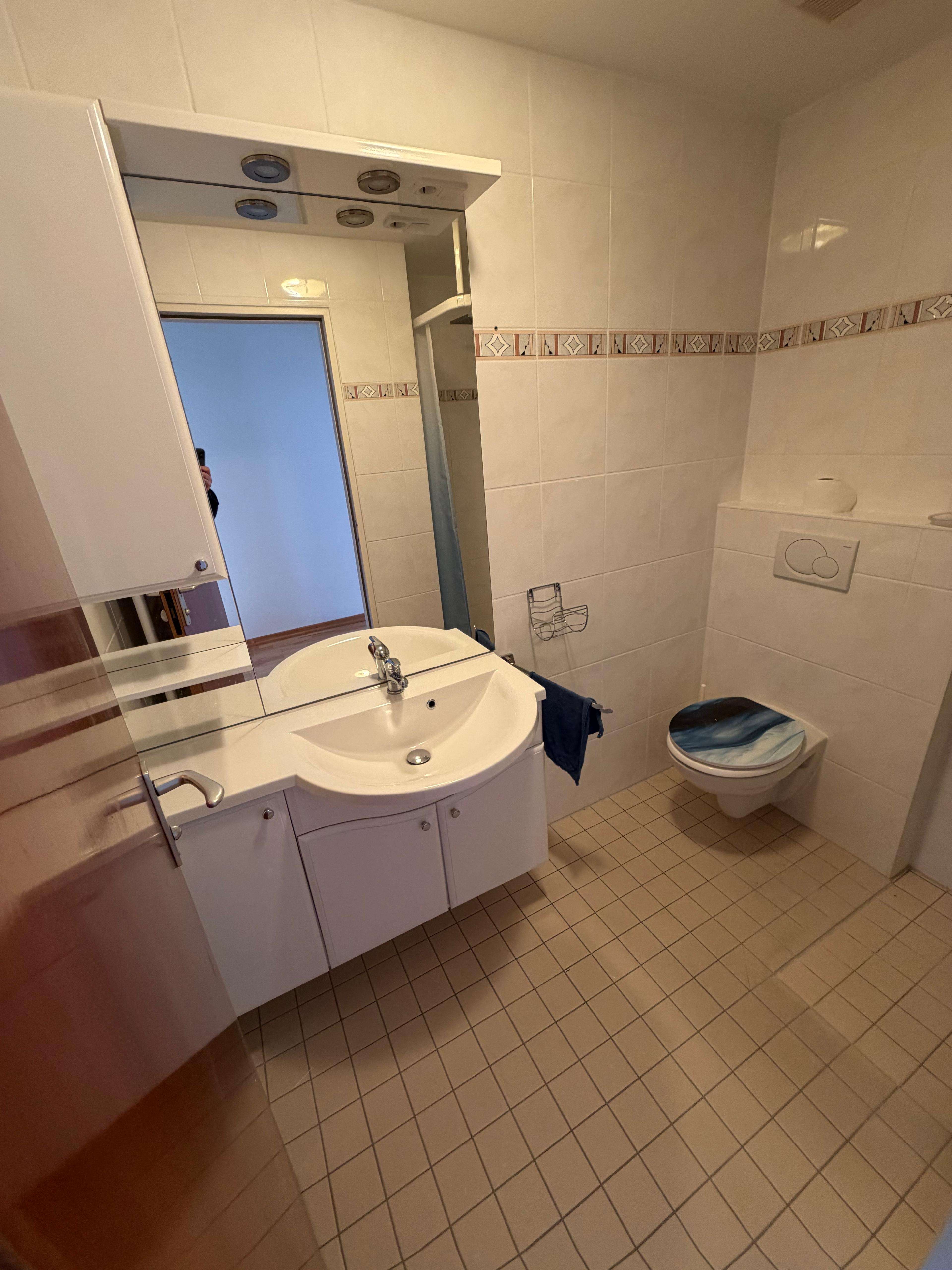 Immobilie in Gmund - Seenahe Wohnung mit Südbalkon und Einzelgarage  - Bild 1