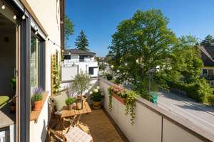 AIGNER - Wohnen über zwei Ebenen – Dachgeschoss-Maisonette mit Balkon in Obermenzing