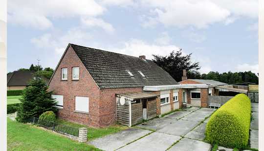Bild von Idyllische Kanallage:  Mehrparteienhaus mit großem Grundstück