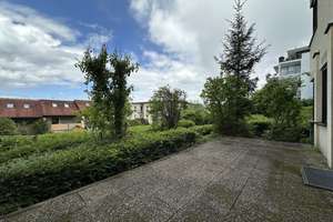 Stilvoll wohnen mit Terrasse und TG-Stellplatz+EBK und FBH