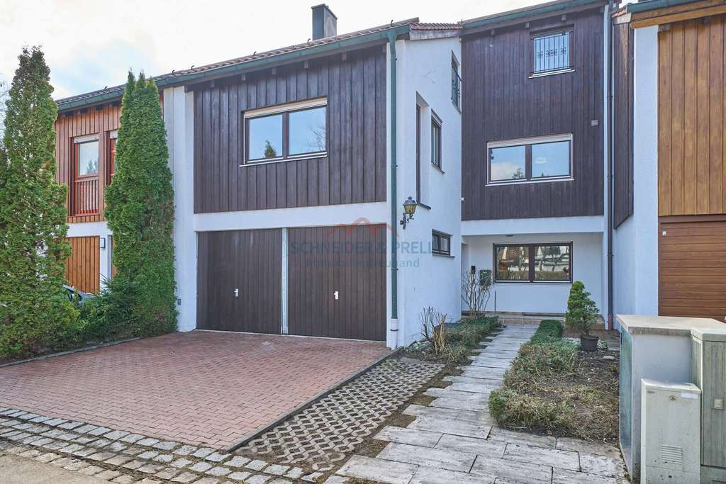 Immobilie in Geretsried - Von außen ein RMH - von innen ein Platzwunder! - Bild 1