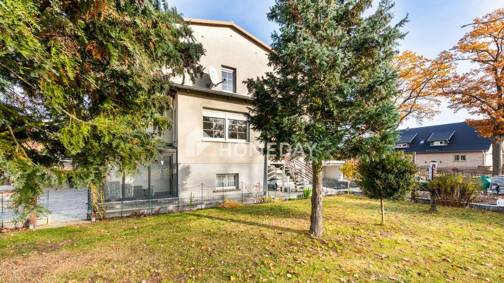 Immobilie in Paulinenaue - Kernsanierte Doppelhaushälfte mit 4 Zimmern, Keller, Tiefgarage, Nebengelass und Garten - Bild 3