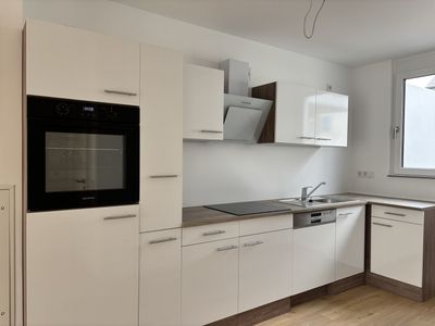 Stilvolles Neubau-Miethaus mit Terrasse und Einbauküche in ruhiger Lage