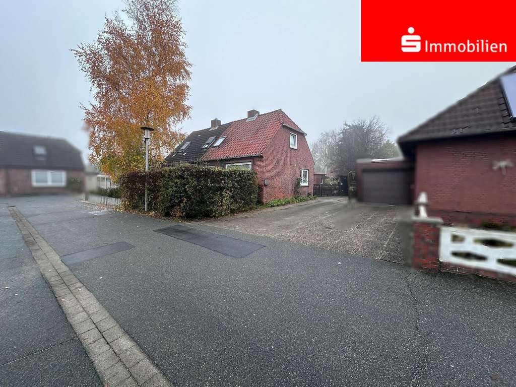 Immobilie in Heide - Vermietete Doppelhaushälfte im Herzen von Heide - Bild 0