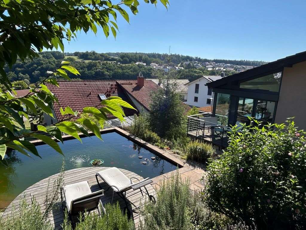 Immobilie in Billigheim - Exklusives Wohnen – Stil trifft Komfort!
Ihr Rückzugsort voller Licht, Raum und eleganter Details - Bild 2