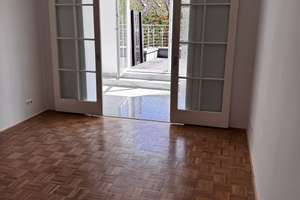 LICHTDURCHFLUTETE WOHNUNG MIT  TERRASSE UND WINTERGARTEN