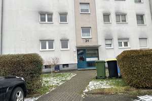 3-Zimmer-Wohnung im Erdgeschoss mit Balkon und Keller – Im Brand 31, 35274 Kirchhain – Vorschaubild 1