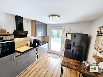 Exklusiv sanierte Haushälfte mit separatem Studio und vielen Möglichkeiten in bester Lage
