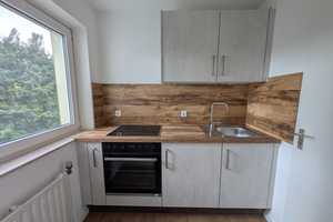 Stilvolle, modernisierte 1-Zimmer-Wohnung mit geh. Innenausstattung mit Balkon und EBK – München – Vorschaubild 4