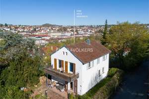 Einfamilienhaus in schöner Aussichtslage mit Modernisierungspotential