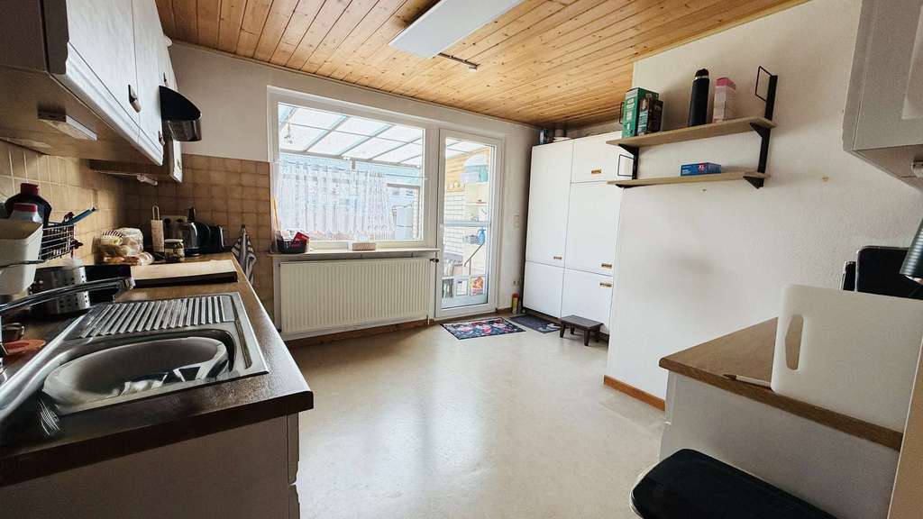 Immobilie in Sarstedt - Reihenendhaus mit Anbau, Garten und Garage - Bild 4