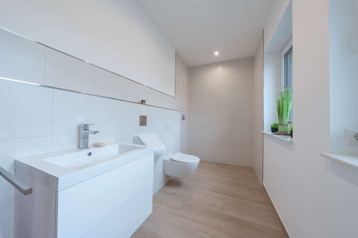 Immobilie in Bippen - Modernes Familienanwesen

Großzügigkeit, Design und Zukunftssicherheit in perfekter Harmonie - Bild 12