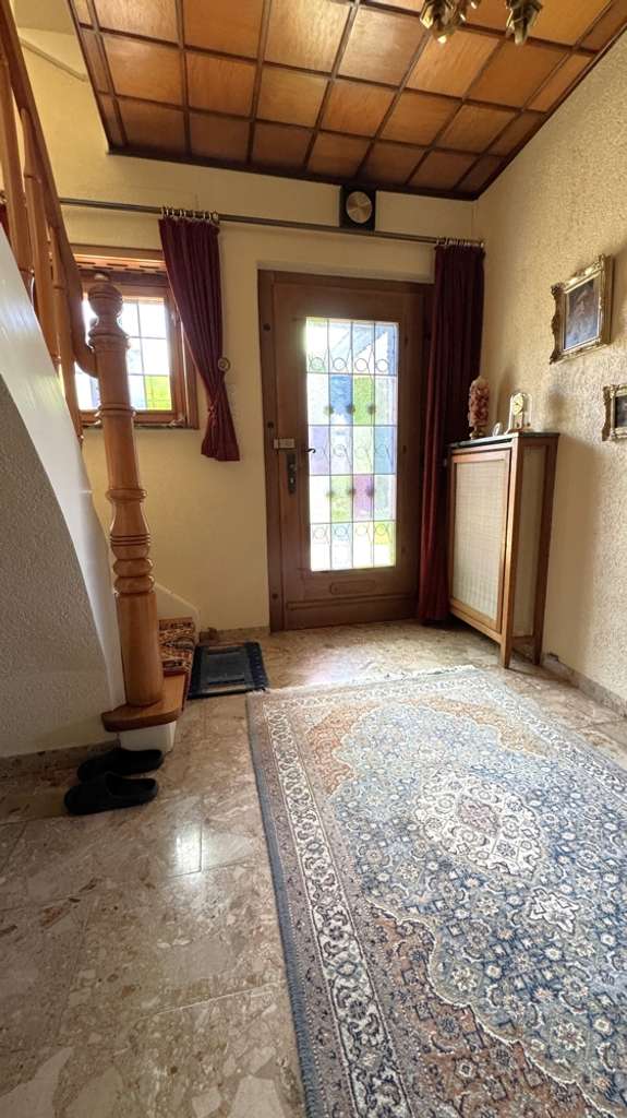 Immobilie in Rüscheid - Familienfreundliches Haus mit Ausbaureserve im Herzen von Rüscheid - Bild 1