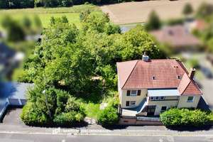 3.229 m² Grundstücksfläche mit Dreifamilienhaus und Doppelgarage an der Haardt – Die vollständige Adresse der Immobilie erhältst du vom Anbieter., 97422 Eselshöhe/Haardt, Schweinfurt – Vorschaubild 1