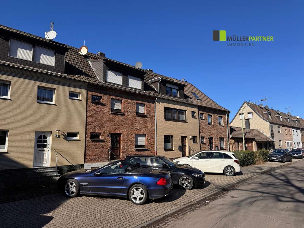 Immobilie in Langerwehe - Gemütliches Einfamilienhaus mit Garage in Langerwehe - Bild 1