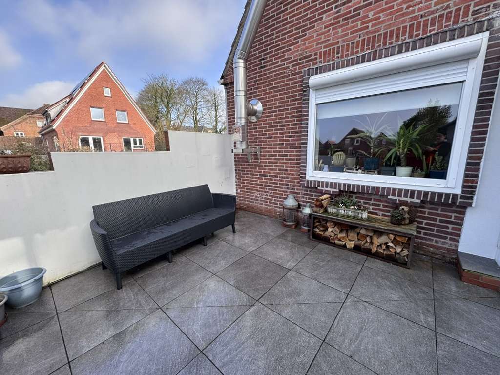 Immobilie in Hinte - Liebevoll modernisiertes Kleinod mit Wintergarten, Nebengebäude und Garagen - Bild 4