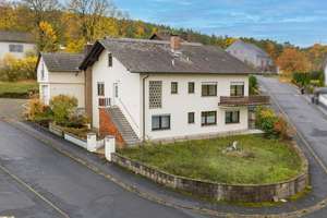 Eigenbedarf oder Rendite: Mehrfamilienhaus plus Rohbauoption, Garten & Terrasse in Bühler-Eußenheim – Die vollständige Adresse der Immobilie erhältst du vom Anbieter., 97776 Eußenheim – Vorschaubild 2