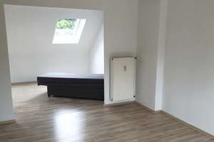 Zwei Zimmer Dachgeschoss  Wohnung in Offenbach-Rosenhöhein der Carl-Ulrich-Siedlung.