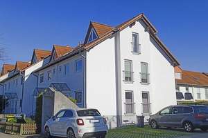 Charmante Maisonette-Wohnung mit Balkon und Tiefgaragen-Stellplatz