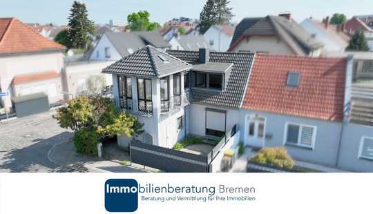 Bild von Doppelhaushälfte mit großzügigem Wohnzimmer und Anbau