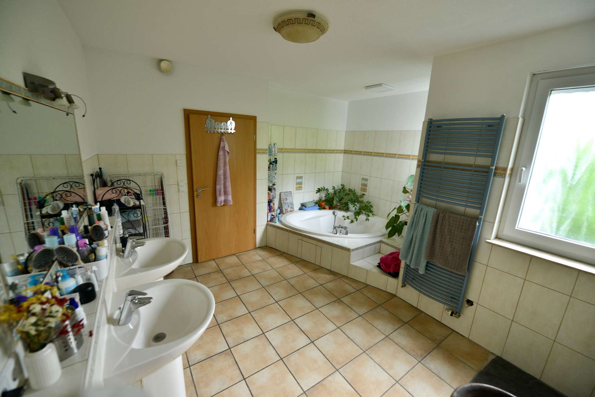 Immobilie in Ebringen - Charmante Erdgeschosswohnung mit Garten in ruhiger Lage von Ebringen: grün gelegen, ideal angebunden - Bild 1