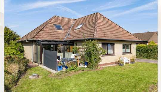 Bild von Familienfreundlicher Bungalow mit Wintergarten, Kamin und großem Garten !