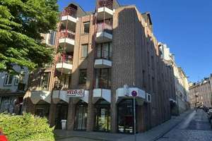 Mehrfamilienhaus mit etablierter Fahrradmanufaktur und nachhaltiger Mieterstruktur am Lindenplatz