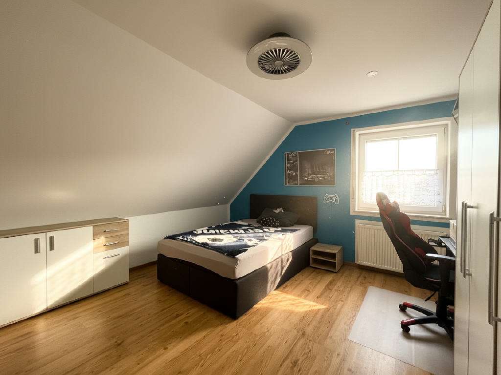 Immobilie in Dorsheim - Attraktives freistehendes Einfamilienhaus mit großem Garten und Einliegerwohnung - Bild 2