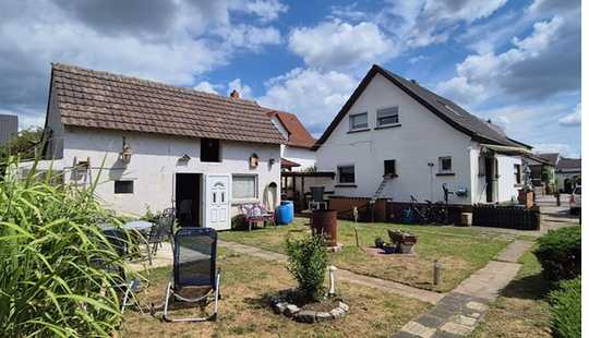 Bild von Vermietetes Einfamilienhaus mit Nebengebäude und Sonnengarten