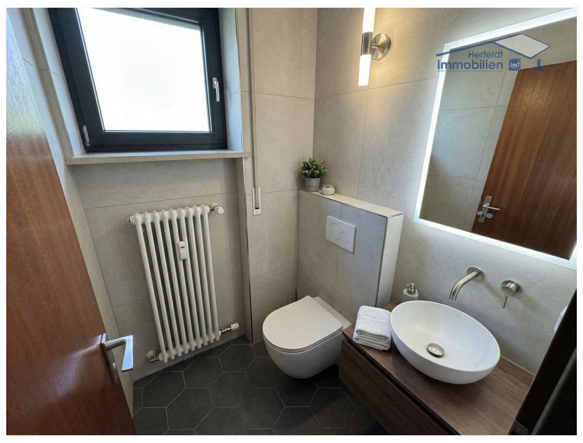 Immobilie in Kaufering - Modernisierte 3-Zimmer-Wohnung mit Süd-Balkon und TG-Stellplatz in zentraler Lage - Bild 3