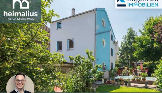 Bild von Besonderes Wohnhaus mit Ruhe-Oase, attraktiver Außenanlage und Doppelgarage