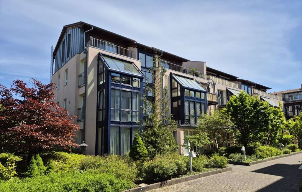 Helle Dreizimmerwohnung mit Wintergarten in zentrumsnaher Lage