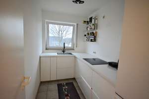 Ansprechende Mietwohnung mit 2 Zimmern, Balkon, Einbauküche und Garage in MG-Odenkirchen – Kölner Str. 97, 41199 Odenkirchen-Mitte, Mönchengladbach – Vorschaubild 4