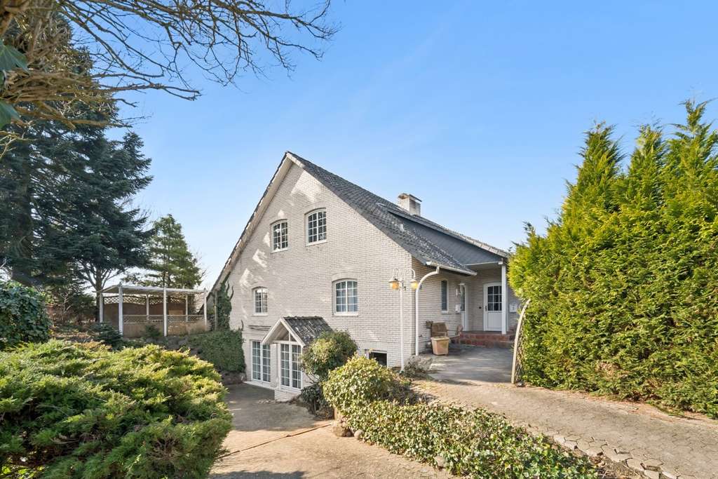 Immobilie in Neuenkirchen - Flexibles Wohnkonzept: Zweifamilienhaus mit Ferienwohnung - Bild 1