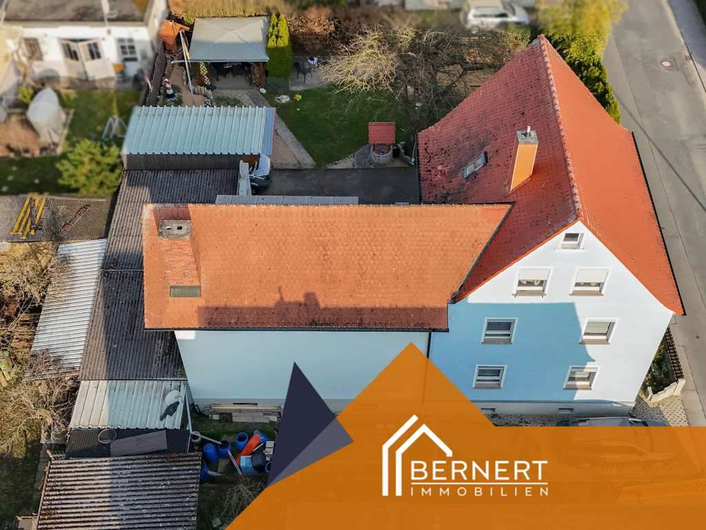 Immobilie in Gundelsheim - Großzügiges Mehrfamilienhaus mit Doppelgarage, Gartenidylle und vielseitigem Nutzungspotenzial - Bild 3