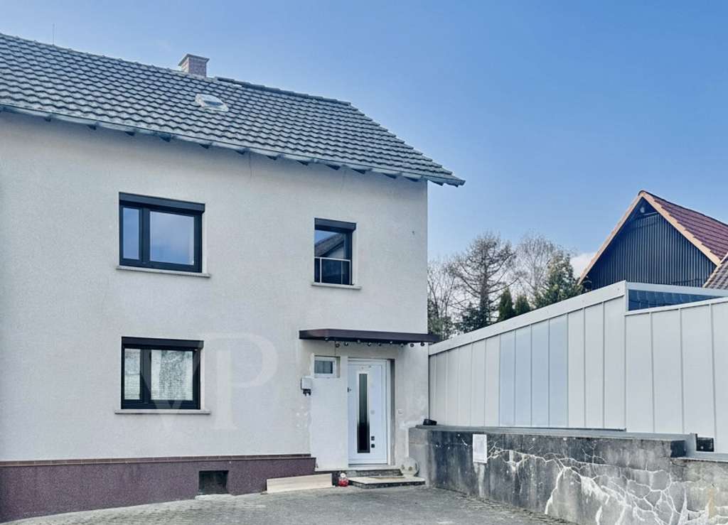 Immobilie in Solms - Gutes Gefühl -  behagliches Einfamilienhaus mit paradiesischem Garten - Bild 1