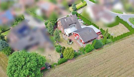 Bild von Wohnidyll - Dreifamilienhaus mit verbundenem Bungalow & traumhaftem Garten - Anlage - Seckenhausen