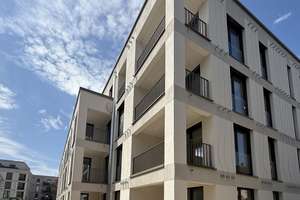 2-Zimmer-Neubauwohnung mit großem Gartenanteil