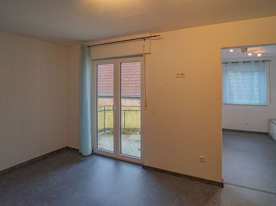 Zimmer mit Zugang zum Balkon