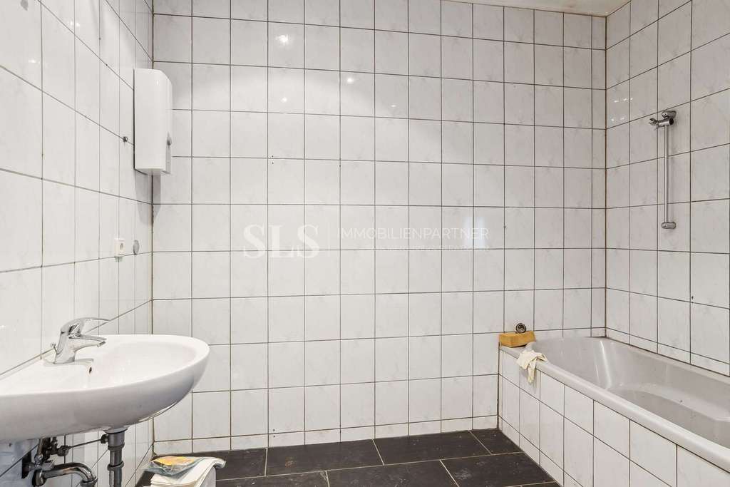 Immobilie in Dortmund - Dreifamilienhaus in Dortmund – laufende Mieteinnahmen und freie Erdgeschosswohnung mit Potenzial - Bild 2