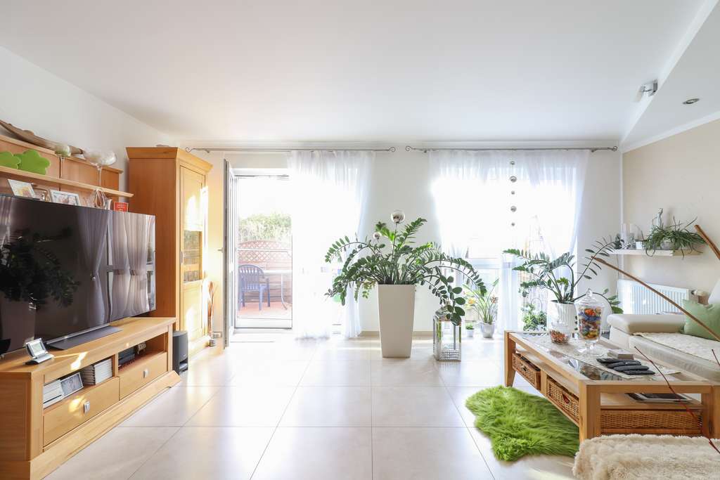 Immobilie in Wöllstadt - Ankommen und wohlfühlen: Modernes Reihenhaus mit Gartenidylle in Wöllstadt - Bild 2