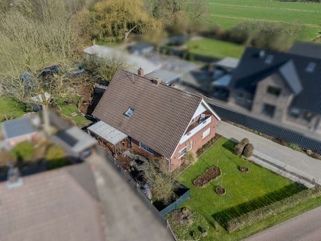 Immobilie in Großefehn - Großzügiges Einfamilienhaus in idyllischer Kanallage von Mittegroßefehn - Bild 2